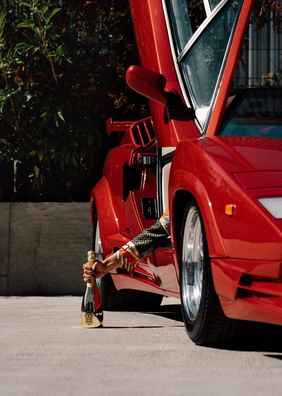 Lamborghini Gold champagne with red lamborghini car
